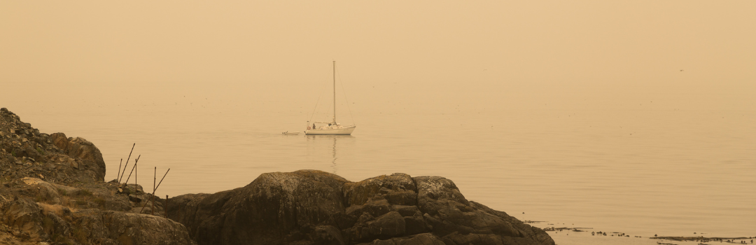 Coastline of Sooke, BC obscured by smoke and haze from the Oregon wildfires 2020 credit: © Adam - Adobe Stock