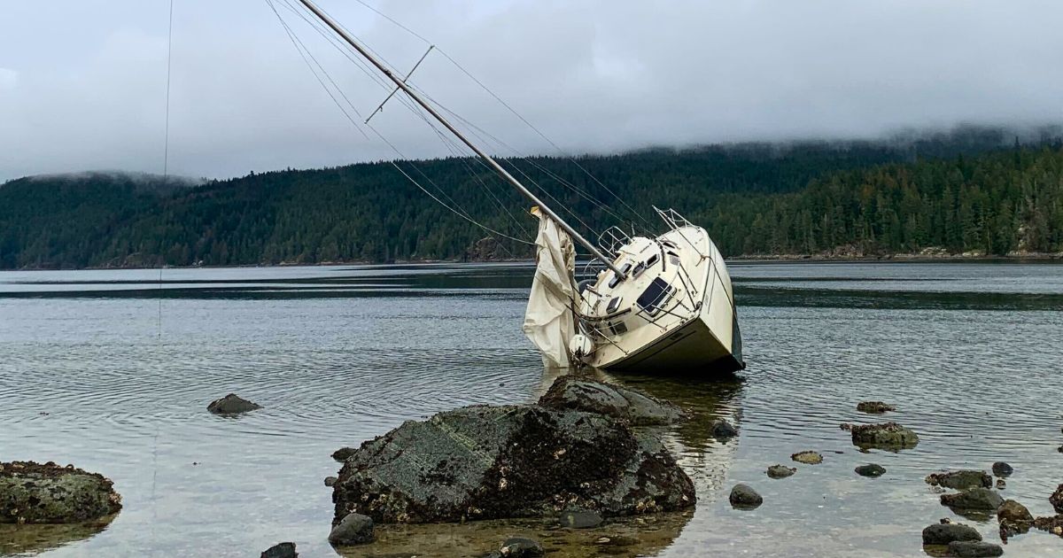 Image of a derelict vessel in Okeover Inlet, January 2023